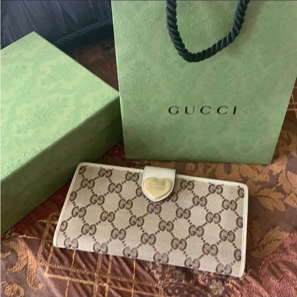 Gucci Handbags - Authentic pre loved Gucci GG canvas Heart logo snap Canvas & leather